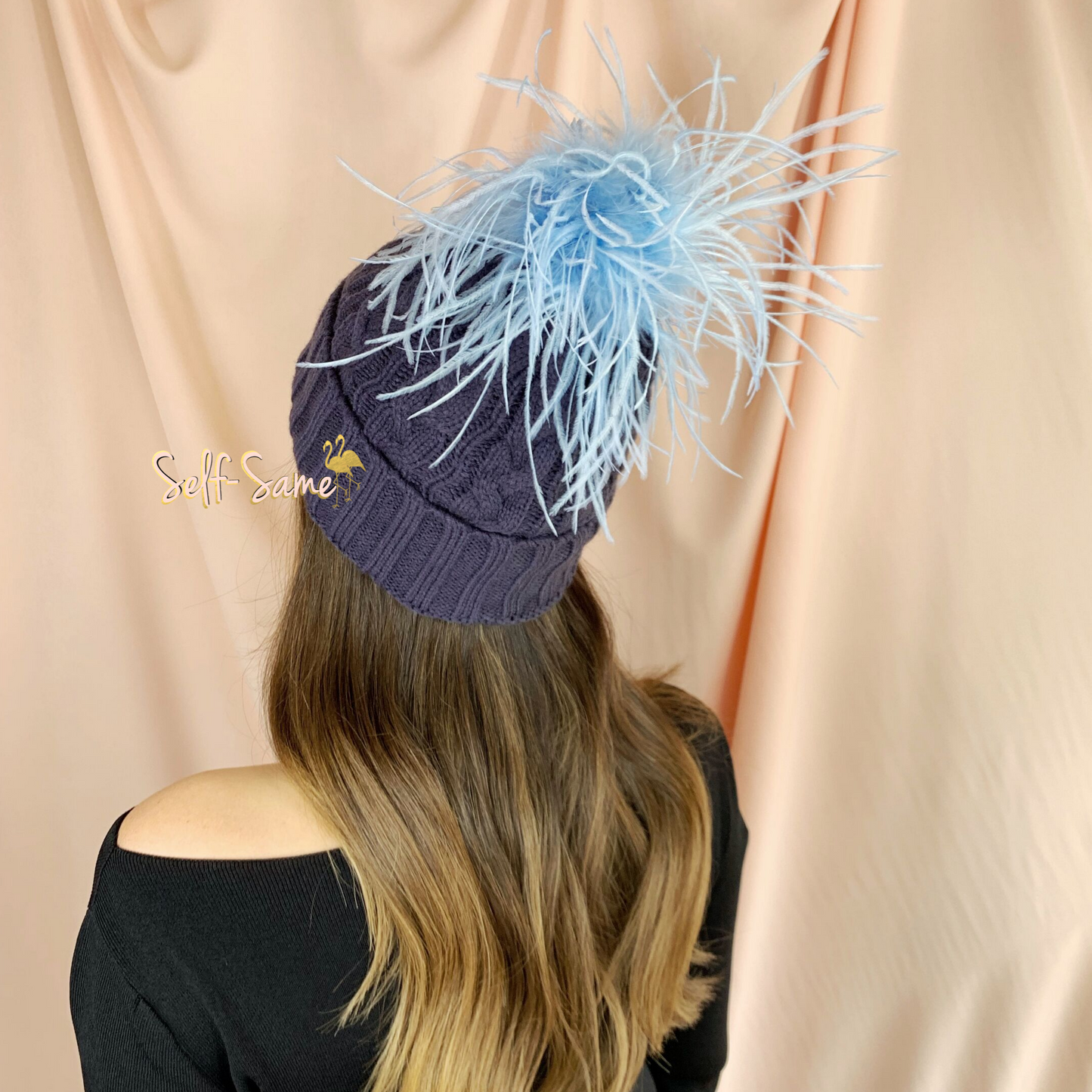 Flossy feather beanie
